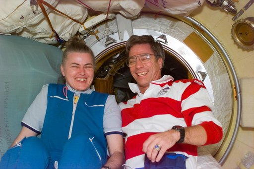 Greeting between astronauts Lucid and Blaha in Docking Module