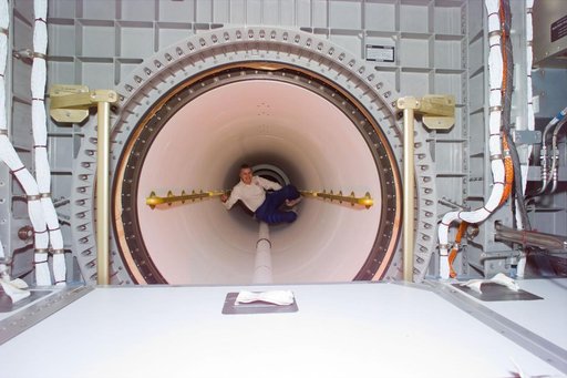 Astronaut Lucid in transfer tunnel