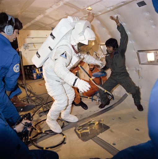 Astronaut C. Gordon Fullerton in donning/doffing exercise experiences
