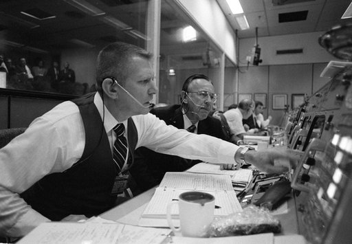 Documentary views of Flight Director and Controller activity during STS-2