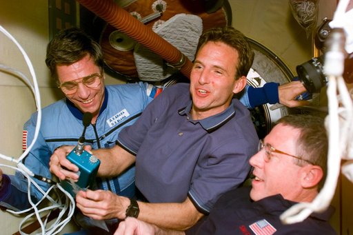 Mir 22 and STS-81 crews gather after rendezvous and docking