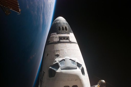 View of orbiter nose and earth limb