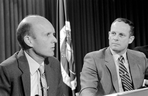 Astronauts Jack R. Lousma, right, and C. Gordon Fullerton greet the press