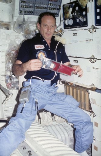Commander Lousma with Bubble Separation Experiment