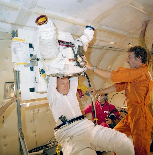 Spacsuit donning and doffing in zero-g training for Story Musgrave STS-6