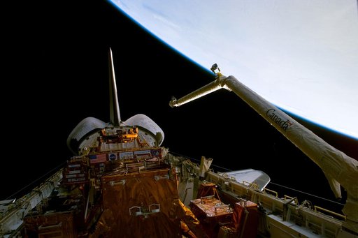 View of the shuttle orbiter Discovery's payload bay during RMS checkout