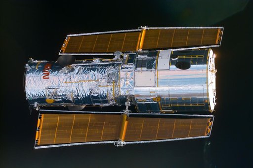 HST,survey views of telescope surfaces during rendezvous and approach