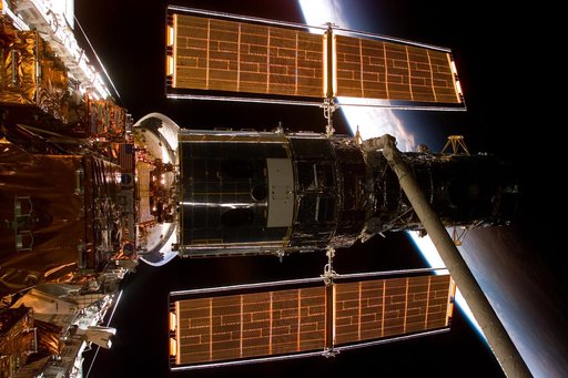 HST,survey views of Hubble after berthing in payload bay on Flight Day 3