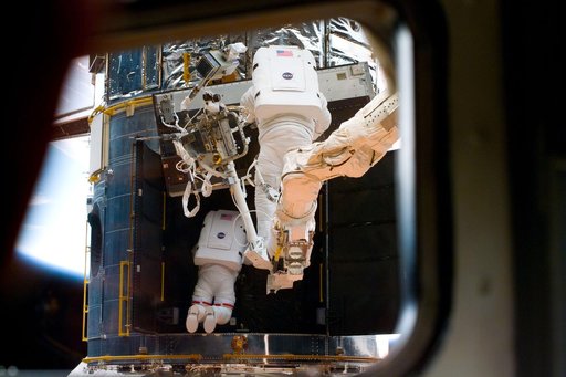 EVA 1 activity on Flight Day 4 to service the Hubble Space Telescope