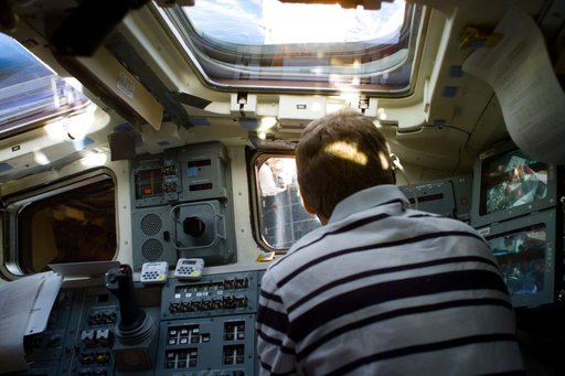Activity on the flight deck during EVA on Flight Day 7
