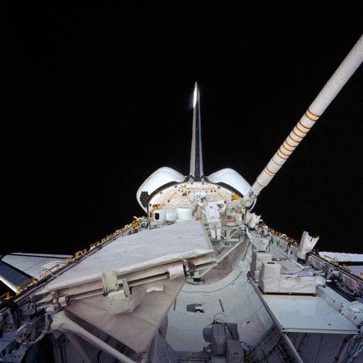 Astronauts Sullivan and Leestma perform in-space simulation of refueling