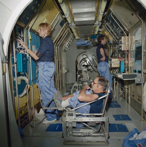 SLS-1 crewmembers in high fidelity mockup of the Spacelab