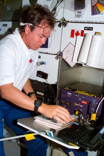MIM - PS Tryggvason checks the procedures for the middeck experiment