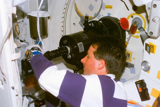 SWUIS - Robinson works with telescope mounted in the side hatch window