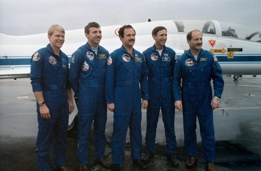 STS-26 crew poses for group portrait at Ellington Field prior to departure