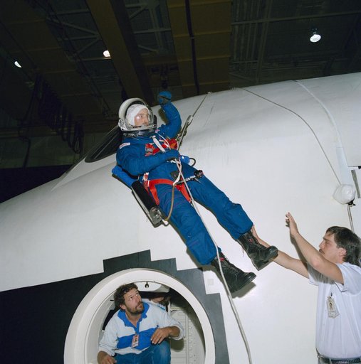STS-29 MS Bagian during post landing egress exercises in JSC FFT mockup