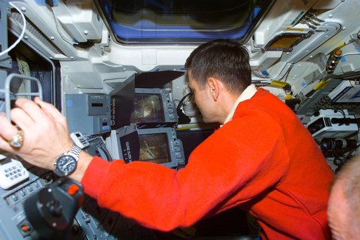 Cabana at RMS controls on the aft flight deck during EVA