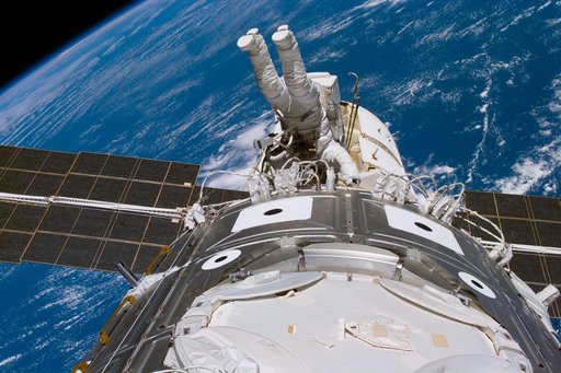 Newman during EVA 3 working on cables