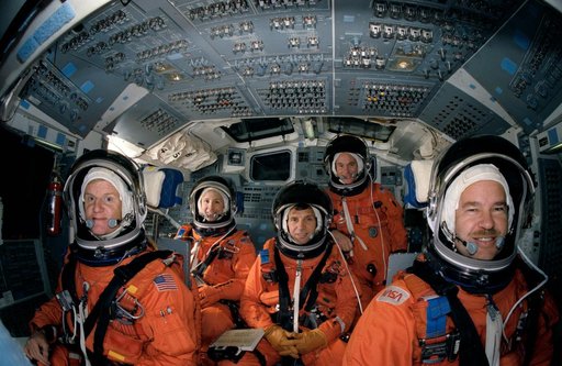 STS-36 crewmembers in LESs pose for portrait on JSC's CCT flight deck