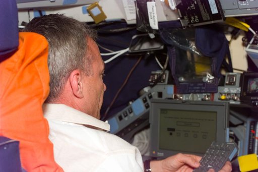 HP - Cdr. Wilcutt enters data for a Human Performance (HP) experiment