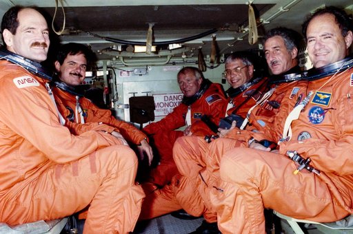 STS-35 crewmembers in M113 tracked vehicle during TCDT at KSC