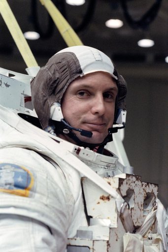 STS-39 MS Harbaugh dons EMU in preparation for dive at JSC's WETF Bldg 29