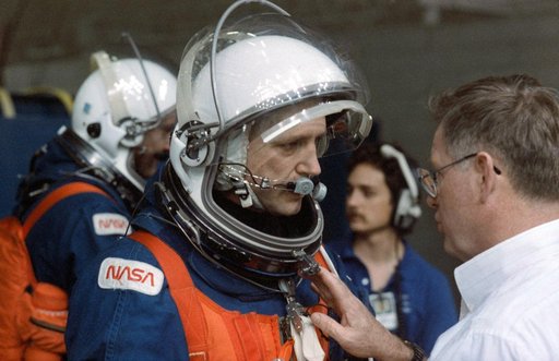 STS-49 MS Akers listens to instructions prior to JSC WETF bailout exercises
