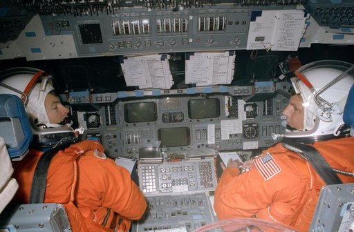 STS-56 Commander Cameron & Pilot Oswald on CCT flight deck in JSC's MAIL