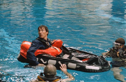STS-60 Cosmonauts in Weightless Environment Training Facility (WETF) training
