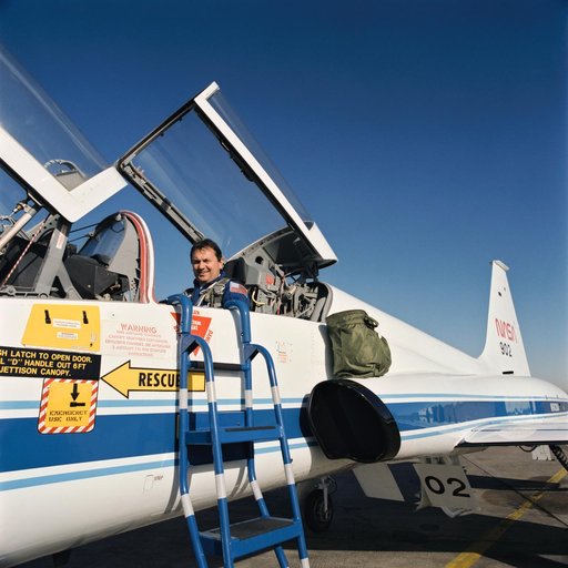 Cosmonaut Vladimir Titov in rear station of NASA T-38 for training flight