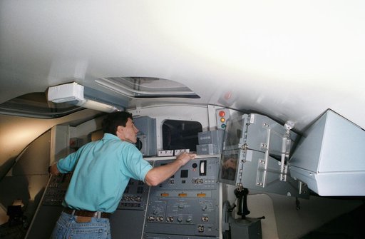 Cosmonaut Sergei Krikalev practices with RMS during training exercise
