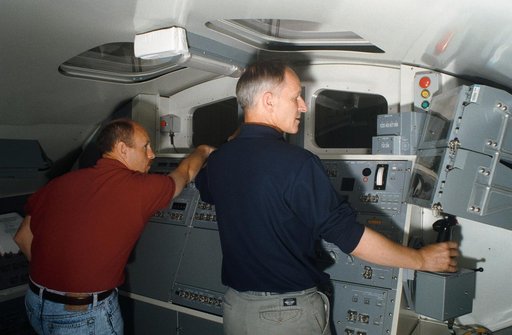 STS-61 crewmembers training with the Remote Manipulator System