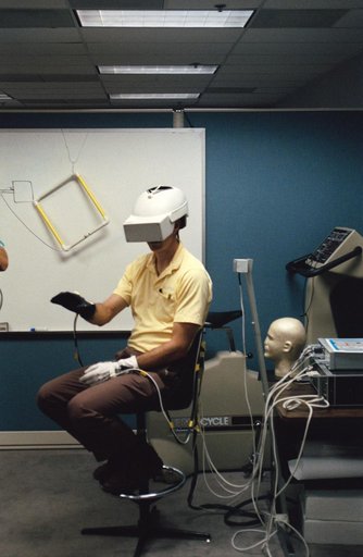 STS-61 crew utilizing Virtual Reality in training for HST repair mission