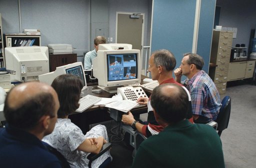 STS-61 crew utilizing Virtual Reality in training for HST repair mission