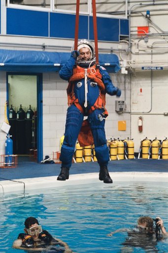 Cosmonaut Vladimir Titov participates in bail-out training for STS-60