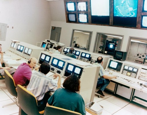 Astronauts Hoffman and Musgrave monitor Neutral Buoyancy Simulator training