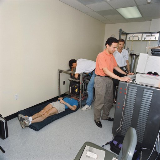 STS-58 crewmembers participate in baseline data collection