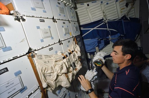 Astronauts Allen, Gemar and Thout during EVA preparation training in CCT