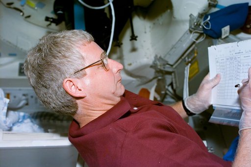 SWUIS,Mission Specialist Hawley works with the experiment