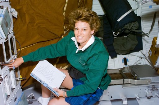 CCM-C,Collins checks the middeck experiment