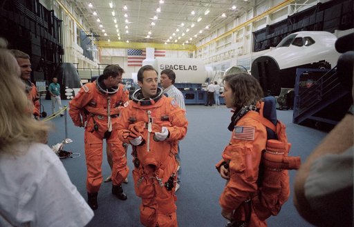 Astronaut Jean-Francois Clervoy chats with STS-66 crewmates