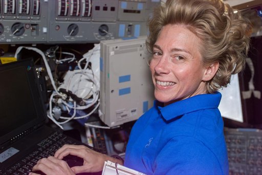 Pilot Still on flight deck with laptop computer