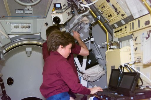 Payload commander Voss in Spacelab with PGSC