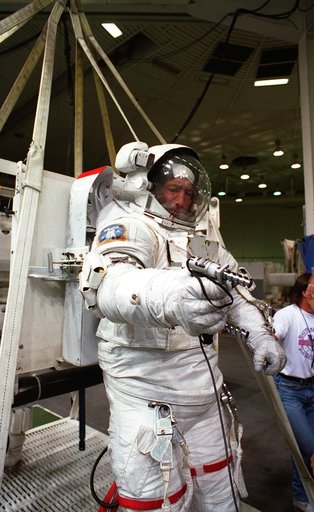 Astronaut Mario Runco in EMU during training in WETF