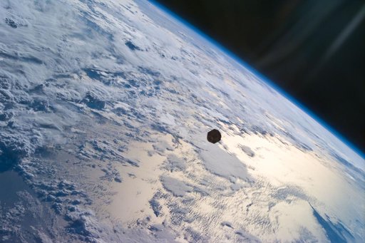 PANSAT satellite deployment from STS-95 Discovery's payload bay
