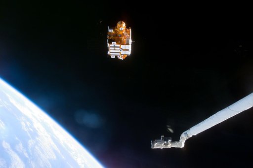 Various views of the SPARTAN 201-5 deployment