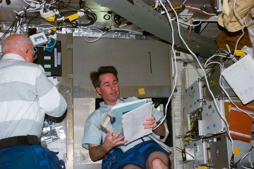 Robinson and Glenn on middeck