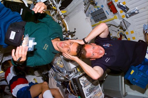 Candid views of Lindsey and Duque on the middeck