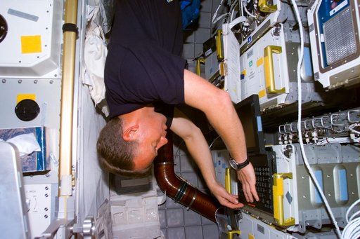 Lindsey with lap top in the Spacehab
