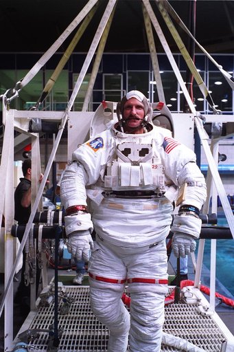 Astronauts Greg Harbaugh and Joe Tanner suit up for training in WETF
